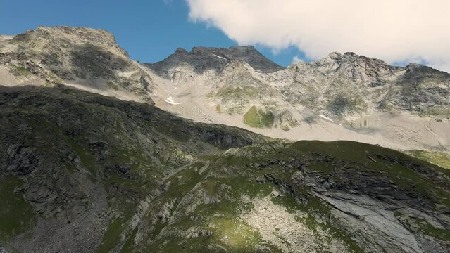Aerial panoramic view of Pizzo Tamb&ograve; and Cime di Val Loga in summer - Italian Alps