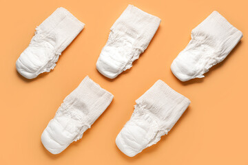 Period panties on orange background