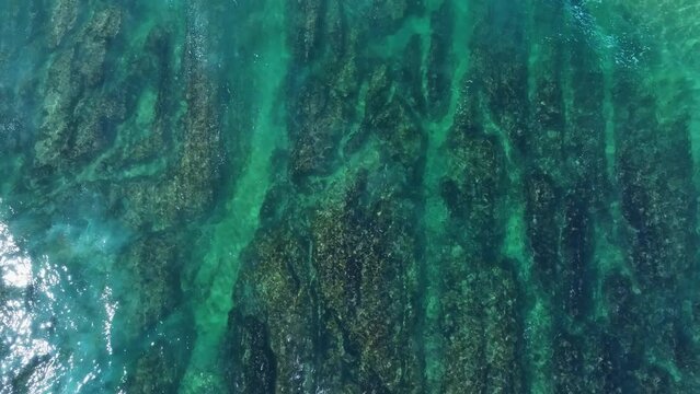 Colors and rock formations of El Sable beach. Coastal landscape in the town of Tagle. Aerial view from a drone. Suances Municipality. Cantabrian Sea. Cantabria. Spain. Europe