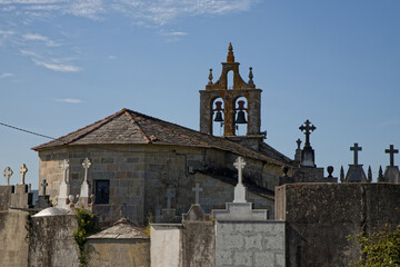 Fototapeta na wymiar VILLOURIZ, October 4, 2023 : Old church and cemetery of a small village on the road to Santiago
