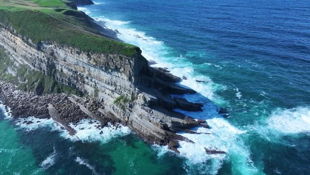 Coastal landscape in Punta Ballota. Sea cliffs near the town of Tagle. Aerial view from a drone. Suances Municipality. Cantabrian Sea. Cantabria. Spain. Europe