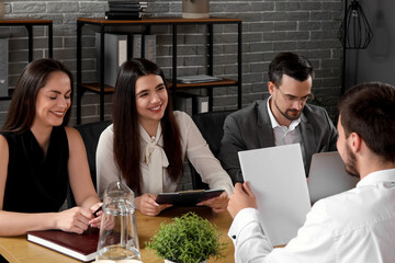 Human resources commission interviewing male applicant in office