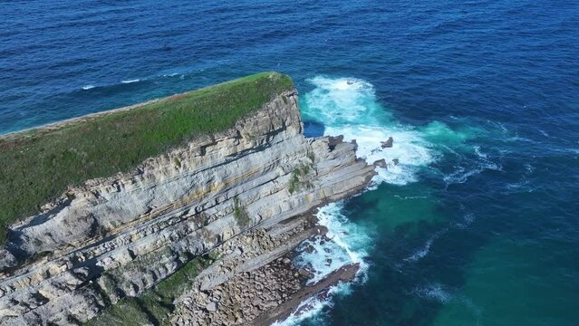 Coastal landscape in Punta Ballota. Sea cliffs near the town of Tagle. Aerial view from a drone. Suances Municipality. Cantabrian Sea. Cantabria. Spain. Europe