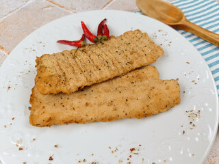 filet de poisson meunière, en gros plan, dans une assiette