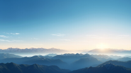 Obraz premium A mountain range, with peaks of various heights and shapes, looms on the horizon The sky is a brilliant, clear blue, and the sun is setting in the distance