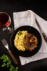 Elegant Dining Experience: Steak, Mashed Potatoes, and Wine