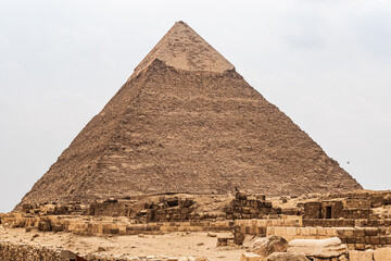Fototapeta na wymiar Khafre's Pyramid: Ancient marvel on Giza's plateau, a timeless legacy echoing Egypt's rich history and the mysteries of the Pharaonic era.