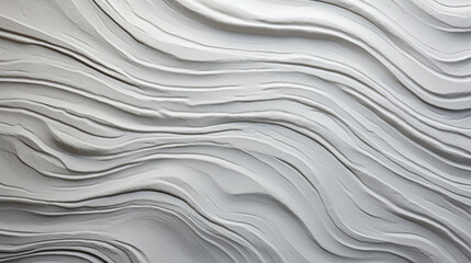 A gray, textured wall, with a subtle pattern of swirls and lines 