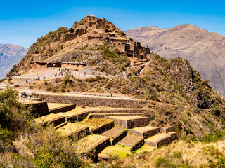 Stunning view of Pisac archaeological complex with ruins of the old town and agricultural terraced fields, Sacred valley of Incas, Cusco region, Peru