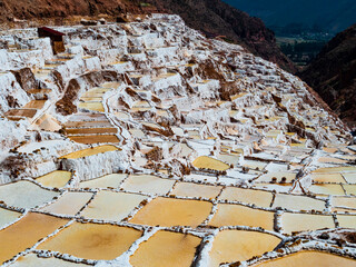 Panoramic view of the famous salt ponds of Maras in the sacred valley of Incas, Cusco region, Peru - 665791441