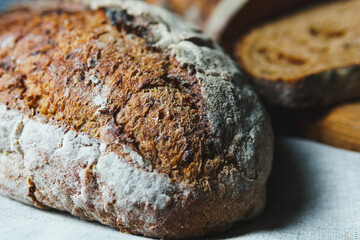 Freshly baked bread with a golden crust close up
