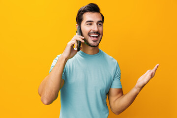 Mobile man portrait cyberspace communication yellow copy smiling phone smartphone happy space phone