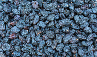 Dried Black raisins close-up view 
