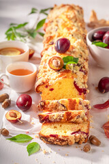 Plum yeast cake freshly baked in kitchen.