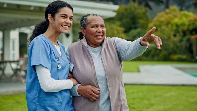 Elderly care, old woman with smile and caregiver in garden in support, help or trust in nursing home. Retirement, healthcare and senior person with nurse walking in backyard together in conversation.