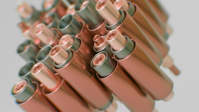 Close up of green and orange Pipes Cylinders on a white background