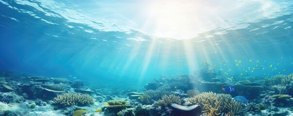 Fototapeta na wymiar World ocean wildlife landscape, sunlight through water surface with coral reef on the ocean floor, natural scene. Abstract underwater background