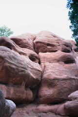 adventurous midwestern red sandstone rock formations against clear bright blue colorado sky