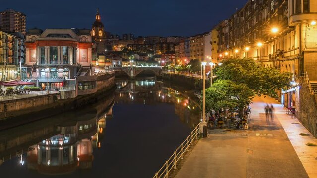 Dusk to night timelapse view of the medieval Casco Viejo neighbourhood of Bilbao, Basque Country, Spain.