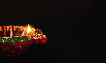 Diwali's warm embrace is felt through these radiant clay diya lamps, signifying prosperity and...