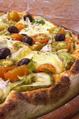 zucchini pizza with brie cheese and tomatoes