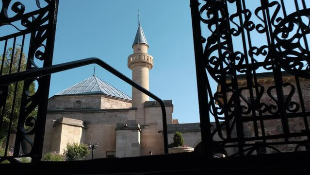 It is the Hacı Bektaş Veli tomb structure and social complex. It is located in Nevşehir district. View of the mosque minaret from the inner door of the tomb.