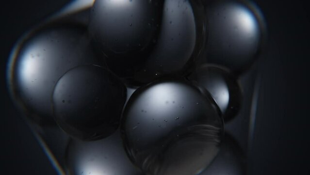 Close up of Cgi black water Bubble Spheres moving around