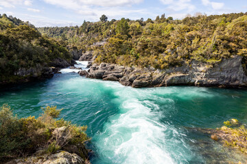 Naklejka na ściany i meble Water released from a dam on the Waikato River, North Island of New Zealand
