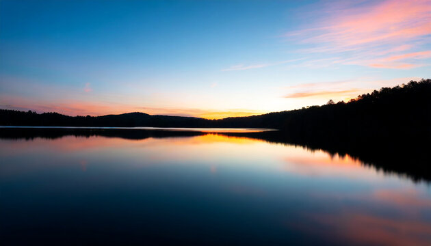 an image of a vibrant sunset over a serene lake with colorful reflections shimmering on the water