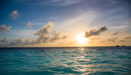 Fototapeta na wymiar colorful sunset over ocean on maldives