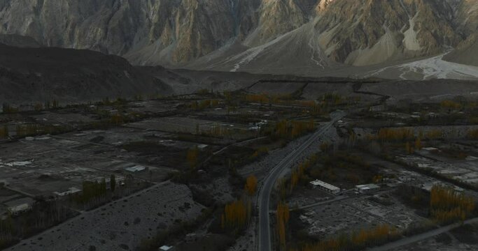 Aerial view of the Karakoram Highway and Passu Cathedral  (or cones) during fall, Hunza Valley, Himalayas, Pakistan