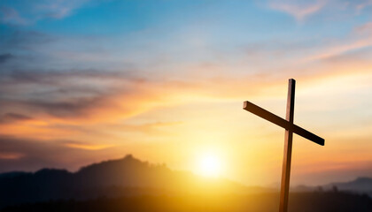 easter and good friday concept soft focus of christian worship with raised hand on cross sunset background