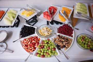 plates with dried fruits and snacks