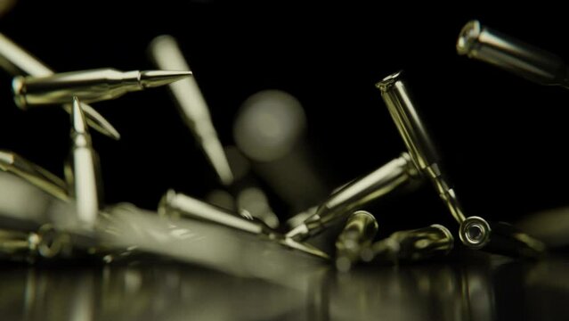 Golden Bullets falling down on a reflective surface