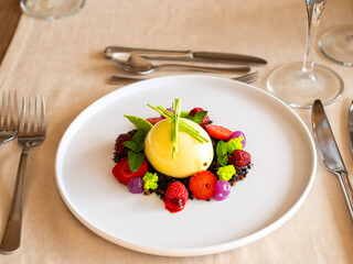 Lemon and blackberry colorful desert
