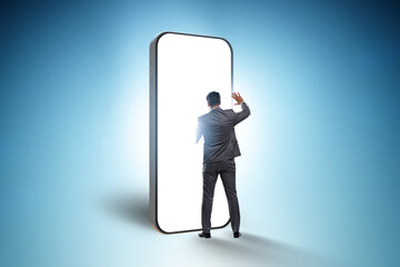 Mobile phone addiction with businessman