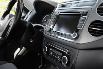 Obraz na płótnie Canvas Closeup view of dashboard with vehicle audio in car