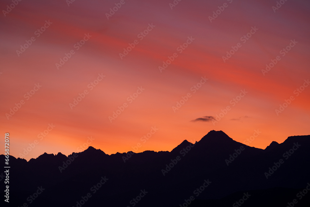 Wall mural View of the mountains at the end of the day