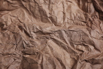 Texture of crumpled parchment paper as background, closeup