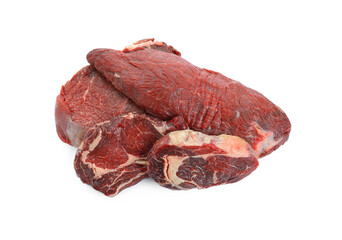 Pieces of raw beef meat isolated on white