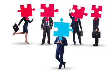 Concept of business people and jigsaw puzzle