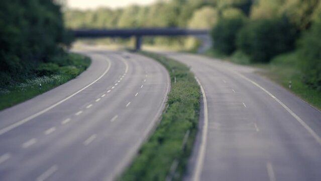 Highway and passing Cars in a miniature time lapse