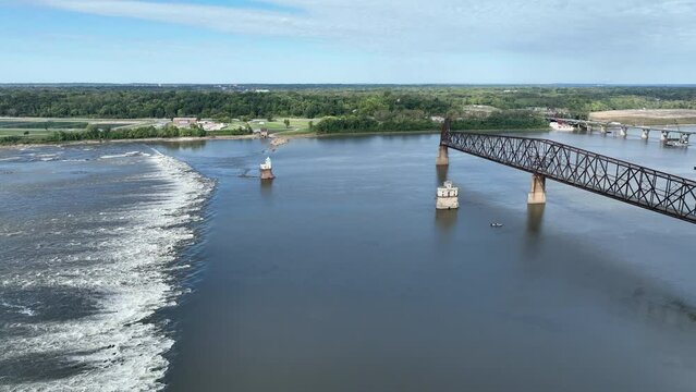 Chain of Rocks on the Mississippi River above St Louis with the Low Water Dam, water towers, old historic bridge and the new bridge with construction work