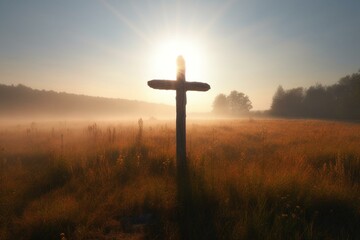 Foggy field with sunlight illuminating wooden cross. Generative AI