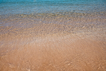 Tropical beach with sea sand on summer vacation.