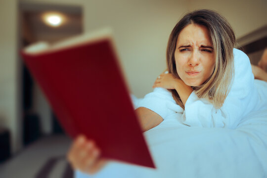 Woman Having Vision Problems Needing Reading Glasses. Millennial girl suffering from early vision loss problems 
