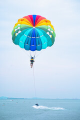 Rainbow parachute on the beach