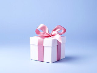 Obraz premium White gift box with pink ribbon over a blue background.