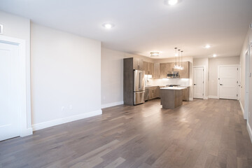 kitchen interior and wooden floor. Simply furniture with utensils, shelves with crockery and refrigerator in modern minimal design, empty space, wood floor