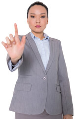 Digital png photo of asian businesswoman pointing on transparent background
